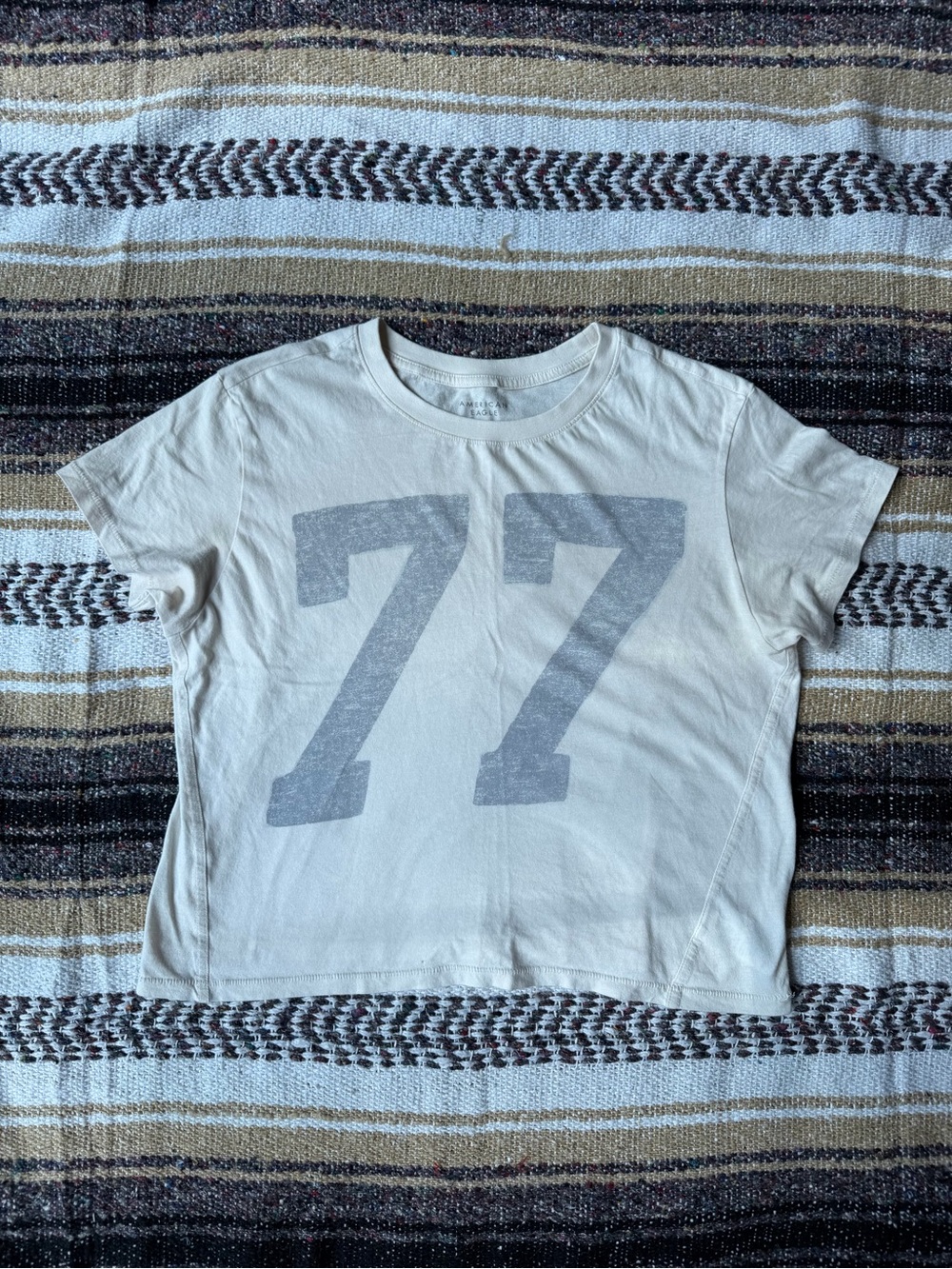 American Eagle Outfitters Cream Graphic Tee with Subtle Print